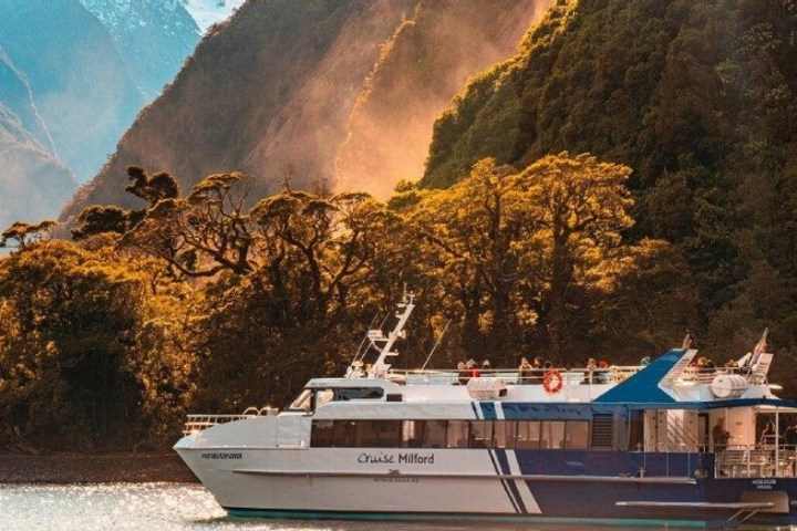 a boat with a mountain in the background