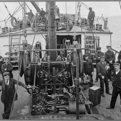 a group of people walking down a street