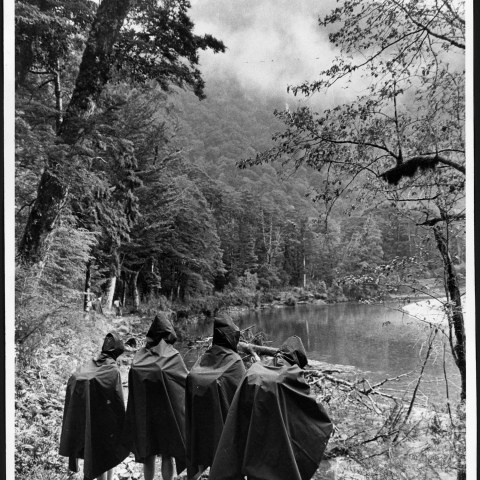 a group of people riding on the back of a horse