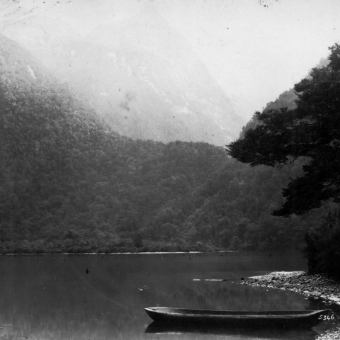 a small boat in a body of water