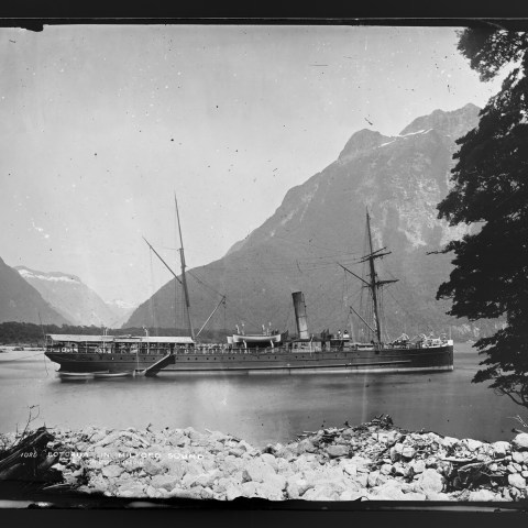 a small boat in a body of water