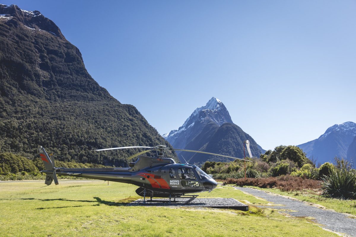 a plane sitting on top of a mountain