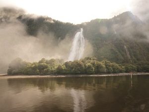 a body of water with smoke coming out of it